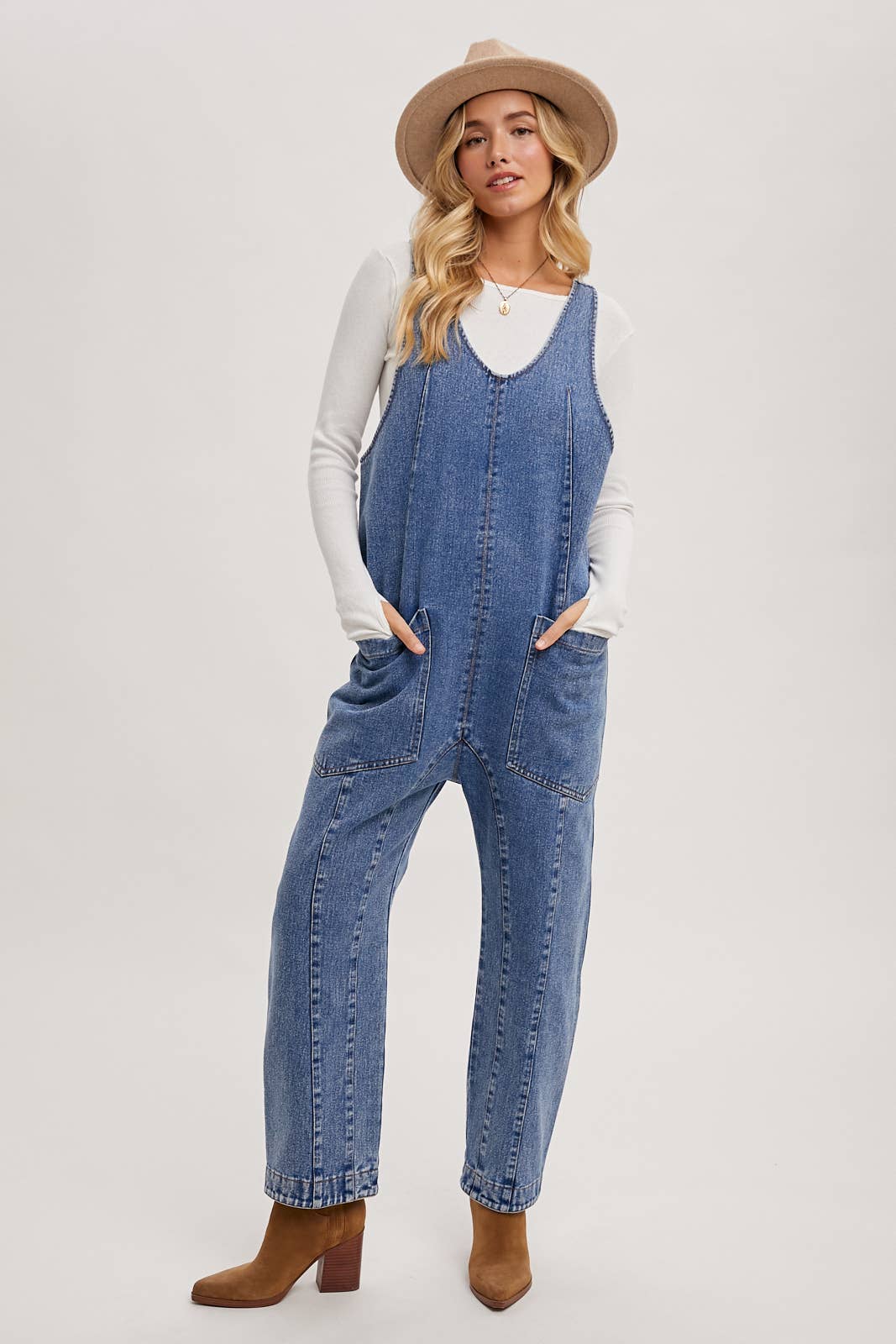 DENIM JUMPSUIT IN A RELAXED FIT WITH HAREM LEGS: LT.WASH